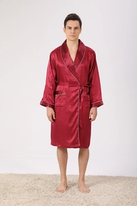 Detail of luxury burgundy satin robe showing contrast piping and striped silk texture