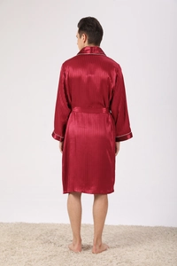 Rear view of luxury wine red satin robe for men featuring white trim and matching belt