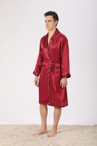 Detail of burgundy satin robe featuring fine white piping and silky pinstripe texture