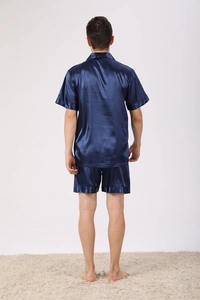 Rear view of dark blue ice silk pajama set with short-sleeved top and matching shorts