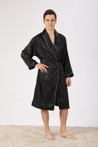 Detail of black silk robe with check pattern and white piping on collar and pockets