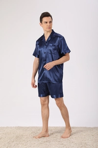 Men's navy blue silk-like pajama set featuring short sleeves and matching shorts