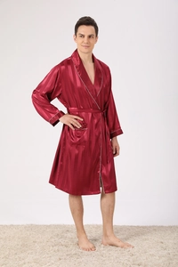 Detail of burgundy striped satin robe showing shawl collar and contrast piping texture