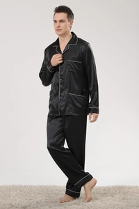 Men's silk satin pajama set in black with white piping detail and classic lapel collar