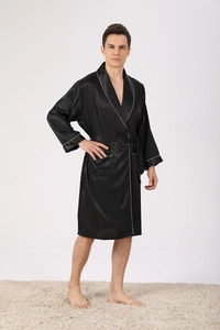 Detail of men's satin robe showing black striped fabric and contrast white piping