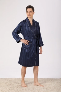 Detail of navy blue silk bathrobe with striped texture and elegant white piping