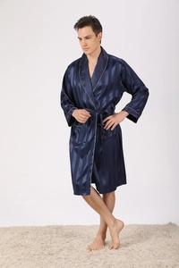 Detail of dark blue silk bathrobe with white piping and subtle stripe jacquard texture