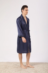 Detailed view of navy silk satin robe featuring white piping and elegant vertical stripes