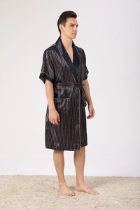 Detail of navy blue silk satin robe featuring gold vertical stripes and contrast white piping