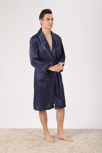 Detail of navy blue silk satin robe with white piping and vertical stripe texture