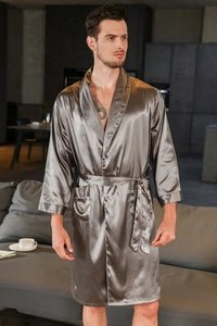 Detail of grey silk bathrobe with white piping and belted waist for men