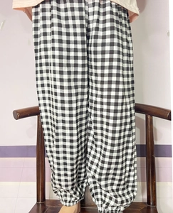 Detailed view of kids breathable black and white gingham pattern bloomers with elastic cuffs