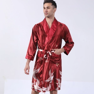 Men's silk satin bathrobe in deep red featuring white crane and floral patterns