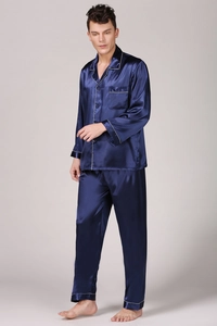 Detail of dark blue satin men's pajama set with contrast piping and silk-like finish