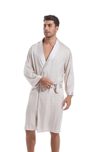 Detail of men's satin robe featuring subtle plaid jacquard fabric and glossy silk trim