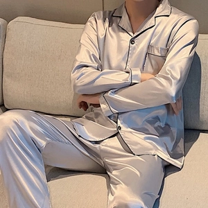 Men's satin pajama set featuring long sleeves and pants in elegant silver-grey silk finish