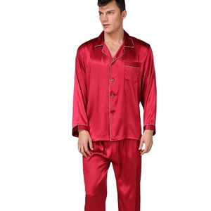 Men's dark red satin pajama set with long sleeves and white piping trim on collar