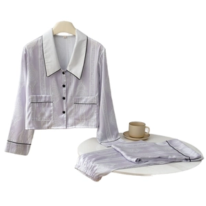 Elegant lavender silk-like long-sleeve pajama set with floral print and white lapel