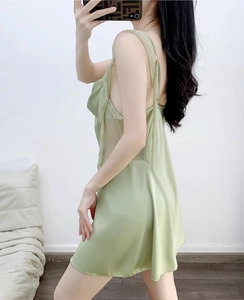 Detail of sage green satin nightgown with adjustable straps and sheer side panels