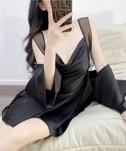 Detail of black satin nightgown with cowl neck and sheer mesh wide shoulder straps