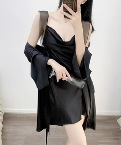Detail of black silk nightgown and robe set featuring elegant lace mesh trim