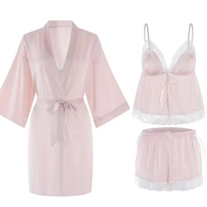 Pink three-piece silk pajamas set with lace trim robe camisole and shorts