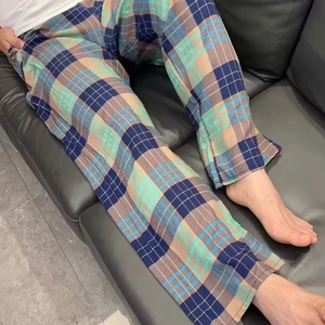 Loose fit blue plaid cotton pajama pants for men and women featuring casual lounge style