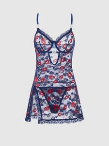 Detailed view of lace lingerie with red lips, heart patterns and metal heart accents