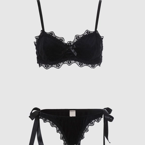 Sexy black velvet lingerie set with lace trim and bow details on bra and side-tie panties