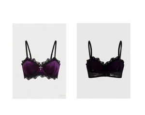 Detail of dark purple velvet bra with black lace trim and metal cross charm decoration