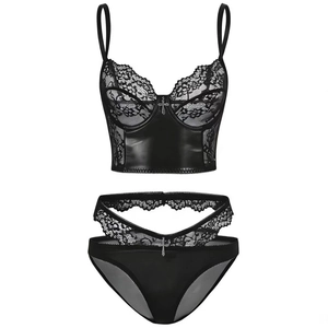 Close-up of gothic PU leather and lace lingerie set with silver cross pendant details