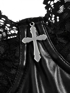 Detail of Gothic PU leather and floral lace stitching with a silver cross pendant