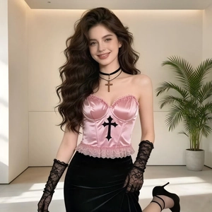 Pink satin corset top with black cross and lace detail in gothic street style