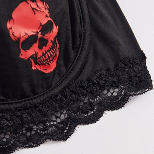 Gothic black bra featuring a red skull print and delicate lace edge detailing