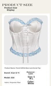 Detail view of white satin corset with blue lace trim and bowknot detail on bodice