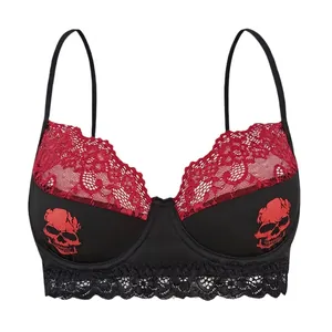 Lace-trimmed underwire bra featuring red skull prints and gothic floral patchwork