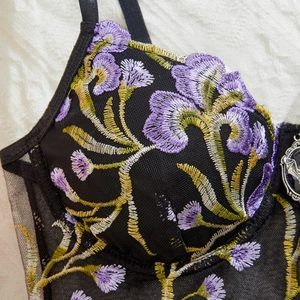 Sexy mesh bustier top with purple floral embroidery and vintage pendant detail