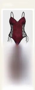 Detail of gothic bodysuit featuring velvet spider lace, bat charm, and corset lacing