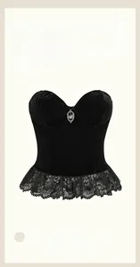 Detail of black velvet corset top with lace trim and silver bat pendant charm
