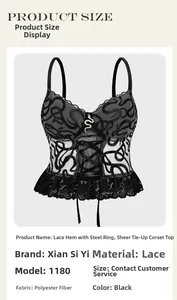Detail of black lace corset top with snake embroidery, underwire, and cross ties