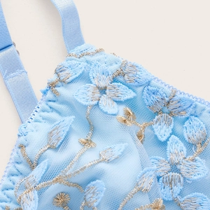 Light blue lace mesh camisole bra with floral embroidery and adjustable straps