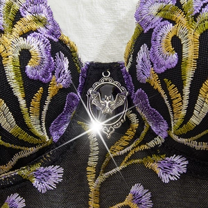 Gothic Halloween mesh bra with purple floral embroidery and silver bat pendant detail