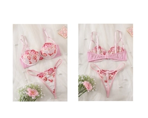 Macro detail of pink floral embroidery on sheer mesh lingerie with 3D flower applique