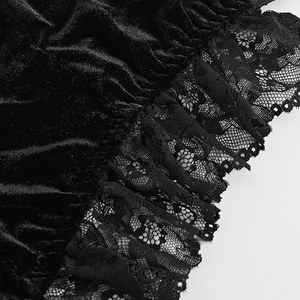 Black velvet corset top with lace trim, bat pendant, and open back detailing