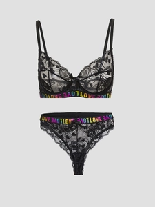 Detailed view of black lace lingerie set with rainbow gradient LOVE letter elastic straps