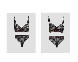 Detailed view of black lace lingerie set with rainbow LOVE letters on elastic bands