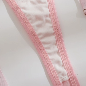 Pink mesh lingerie set with white cotton lining, lace embroidery, and metal adjusters