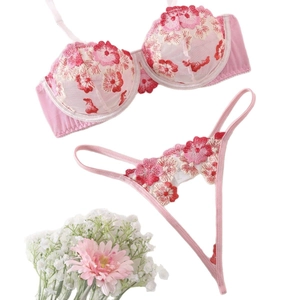 Pink sheer mesh lingerie set with floral embroidery and underwire bra details