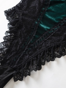 Detail of emerald green velvet bodysuit with delicate black lace and eyelet trim