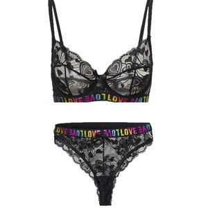 Black lace lingerie set with rainbow LOVE elastic band and heart patterns on white backdrop